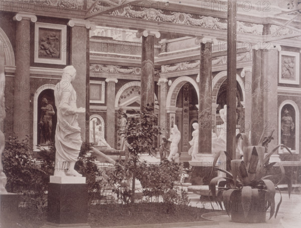 'Exterior of the Italian Court', Crystal Palace, Sydenham, 1852-1854. Designed by Sir Joseph Paxton to house the Great Exhibition of 1851 in Hyde Park, the Crystal Palace was reconstructed and enlarged in Sydenham in 1852. The first column was raised on 5 August 1852 and the palace was opened by Queen Victoria on 10 June 1854. Many exhibitions and events were subsequently held at the Crystal Palace until it burnt down on 30 November 1936. The park contained a motor racing circuit from 1937 until 1972 and the famous athletics track dates back to the foundation of the Crystal Palace Athletics Club in 1868. Plate 84 from "Photographic Views of the Progress of the Crystal Palace, Sydenham. Taken during the progress of the works, by desire of the directors, by Philip H Delamotte. Together with a list of the directors and officers of the company, etc". [London, 1855].