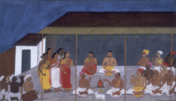 One of the ceremonies undertaken during the life of a Brahmin, 1820. A group of people sit cross-legged under an awning with a fire in the foreground. Musicians are seated at far left, with five women standing watching.