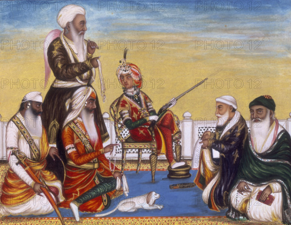 The durbar of December 1845; the Maharaja Dalip Singh is seated on a chair holding a gun, a pet lap dog at his feet and an attendant with a fly-whisk behind him. On the Maharaja's left is Diwan Dina Nath and Fakir Nu ud-Din holding a book and prayer-beads.