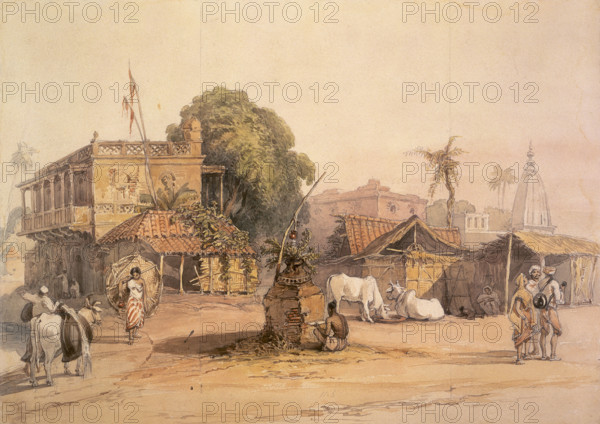 Indian village, c1835. Street scene showing a small 'tulsi' altar, centre, and a water carrier with his bullock, left. A holy man sits before the altar, and some sacred cattle are seen at right.