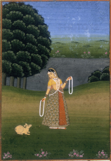 A woman in a garden, beckoning a cowering animal, (c17th-c18th century?).