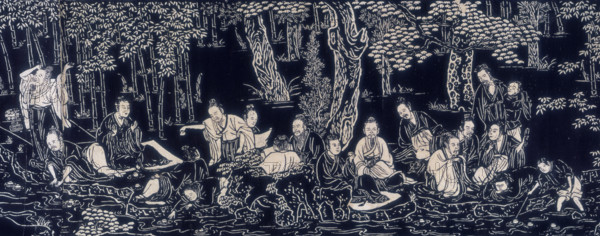 A gathering of robed men seated in a forest. Boys paddle in a river.