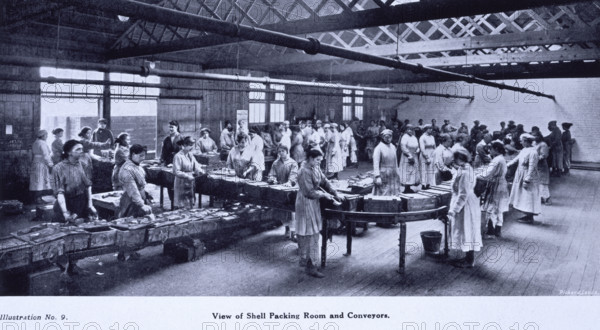 Shell packing room and conveyors, Leeds, 1919. From "The story of Barnbow" by R.H. Gummer, Chief Engineer, detailing the history and war work of the No. 1 National Filling Factory in Leeds, which was built in 1915 during the First World War, and employed many women to fill shells with high explosives. An explosion in 1916 killed 35 women outright, maiming and injuring dozens more.