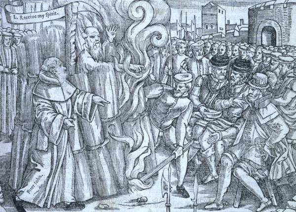 The burning of Thomas Cranmer, Archbishop of Canterbury, 1556, (1563). As he is burned alive, Cranmer says 'L. [Lord] receive my spirit'. He renounced the recantations that he had written or signed with his own hand, and he stated that, in consequence, his hand would be punished by being burnt first. As the flames drew around him, he fulfilled his promise by placing his right hand into the heart of the fire, calling it 'that unworthy hand'. His dying words were, 'Lord Jesus, receive my spirit. I see the heavens open and Jesus standing at the right hand of God.' From "Actes and Monuments of these Latter and Perillous Days, Touching Matters of the Church", popularly known as Foxe's Book of Martyrs, by John Foxe.