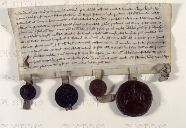 Copy of letters confirming the truce between Henry III of England and Louis IX of France, 1258. The claim of Henry III to the French lands lost by his father John and his position as Duke of Aquitaine made for constant tensions with the French King during the first part of his reign. In 1258, Simon de Montfort, Earl of Leicester, and four other envoys negotiated a truce between Henry III and the French ruler Louis IX. The large seal on the right is de Montfort's. The truce enabled de Montfort and his baronial allies to pursue their agenda of increasing their power at the expense of that of the King.