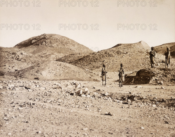44th Hill, near Gandamak, Afghanistan, 1880. Four (probably British Indian Army) soldiers stand guard in a barren landscape. By the Treaty of Gandamak, signed in 1879, Britain acquired territory and the right to keep a representative in Kabul.