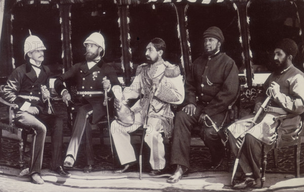 The Amir of Afghanistan with officials, Gandamak, Afghanistan, May 1879. During the Second Afghan War, Afghanistan became a British protectorate under the Treaty of Gandamak, which was signed by the Amir, (centre), and Lord Lytton the Viceroy of India, on May 26, 1879. Also present were Sir Louis Cavagnari, political officer on special duty; Mr Jenkyns; General Daud Shah; and Habeeboolah Mustataphi. Several months later Afghan soldiers rioted over pay; Cavagnari and Daud Shah were both killed.