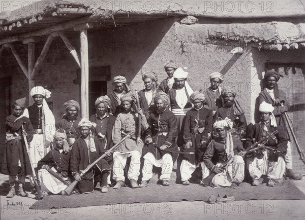 Kabul Police, Afghanistan, c1880. Police with rifles outside a mud-built building.