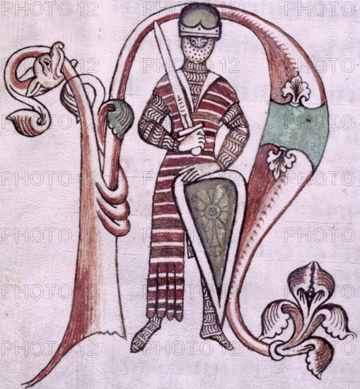 Knight with sword and shield, 12th-13th century. He wears a long-sleeved hauberk (coat of chainmail), under a flowing gown. Within initial letter N.