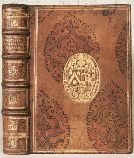 Book binding made for Jacques-Auguste de Thou, c1606. This gold-tooled and stencilled binding for the French historian and book collector Jacques-Auguste de Thou shows his arms impaling those of his second wife, Gasparde de la Chastre.