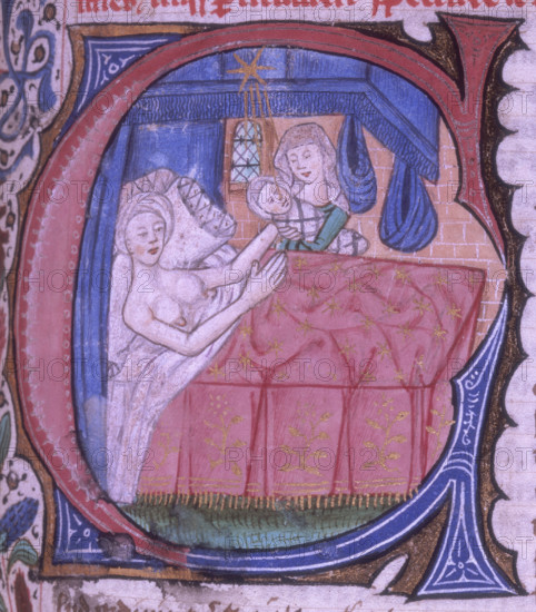 Birth scene, 1490. Historiated initial 'C'(um): a midwife presenting the newborn to the mother, who rests in bed. A star shining into a birth-chamber sheds its influence on the new-born child. Beginning of the Tractatus de nativitatibus. From Liber Astronomiae.