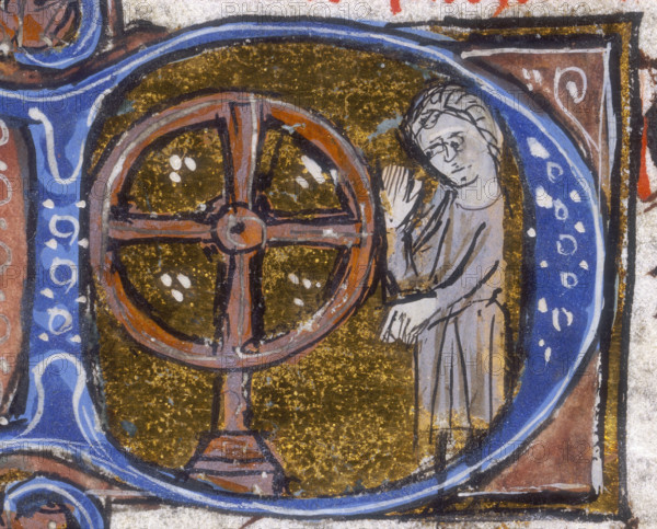 A wheel of fortune, early 14th century. The wheel is associated with fate and chance. From a medieval manuscript of Ptolemy's "Tetrabiblos" (Four Books). The books explore the ways in which the configurations of the heavens can affect what happens on earth, including what happens to people.