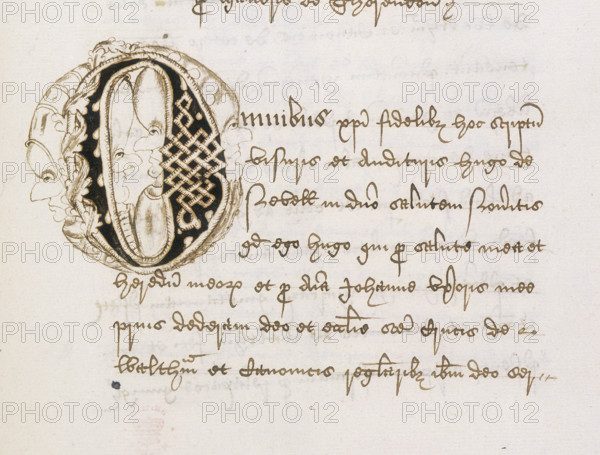 Initial from a register of deeds, early 16th-century. Decorative letter 'O' with grotesque faces, leaf design and lattice pattern. From deeds and other documents of Waltham Abbey in Essex.