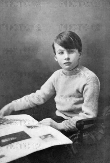 Raymond Wilfrid Sholto Douglas aged 9, 1911. Raymond Douglas (1902-1964) was the only child of Lord Alfred Douglas and Olive Custance. Alfred Douglas was famously involved in a homosexual relationship with Oscar Wilde. After Wilde died, Alfred Douglas married Custance who was also bisexual. From "Oscar Wilde and Myself" by Lord Alfred Douglas. [London, 1914].