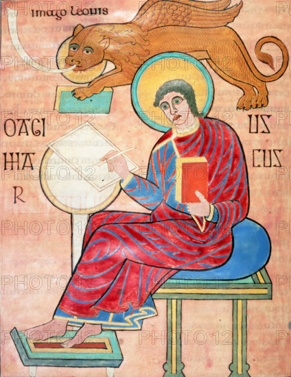 St Mark writing, c700. St Mark sits writing; a winged lion hovers above him. From the Lindisfarne Gospels, thought to have been written and illuminated by Eadfrith, Bishop of Lindisfarne.