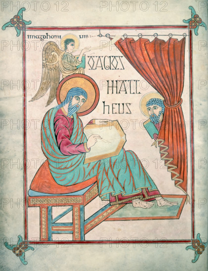 St Matthew, c700. St Matthew writes in a book; another man peers out from behind a curtain, while an angel blows a trumpet above. From the Lindisfarne Gospels.