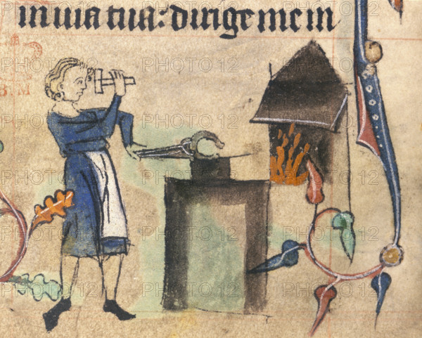 Blacksmith, 15th century. Wearing an apron and hammering a horshoe. A fire can be seen burning in the furnace. The blacksmith also had religious connections as he was able to create substances from rocks, a reference to God's creation of the world. This image comes from the margins of a book of hours. Scenes of everyday life were often depicted in the books reflecting their everyday use. From a book of hours.