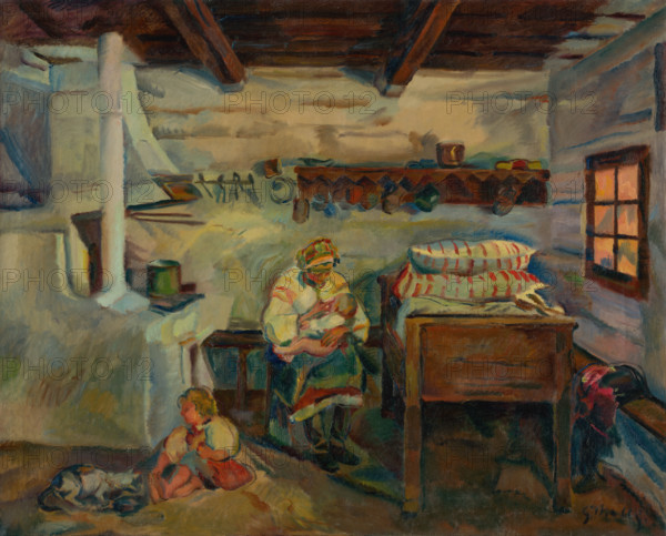 Interior, Zdiar, c1934. Mother breastfeeding her baby while an older child plays near the stove.