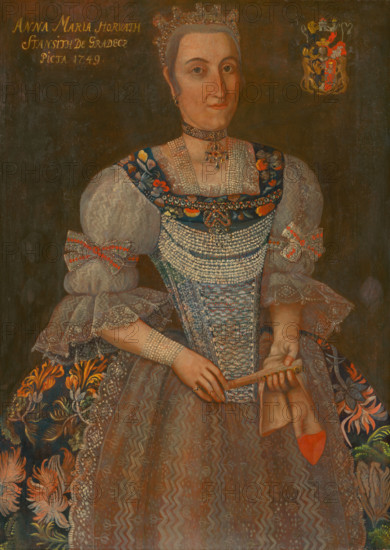 Portrait of Anna Maria Horvath-Stancic de Gradez, 1749. Well-to-do woman in an embroidered dress trimmed with lace, ribbons and pearls, wearing a jewelled choker and a tiara.
