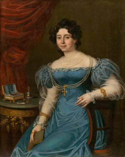Portrait of a woman in a blue dress (Tereza Mattyásovszká, née Bydesházyová), 1827. Woman in a lace-trimmed dress, holding a book. She wears pearl necklaces and gold bracelets. On the table is a sewing box with scissors and thread, and a bell for summoning servants.