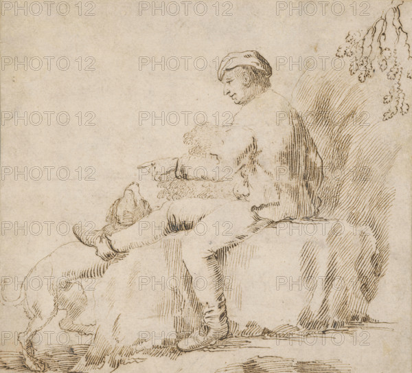 Study of a seated man playing with a dog, around 1600.