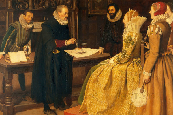 William Gilbert demonstrating the magnet before Queen Elizabeth, 1598, c1912. Creator: Ernest Board.