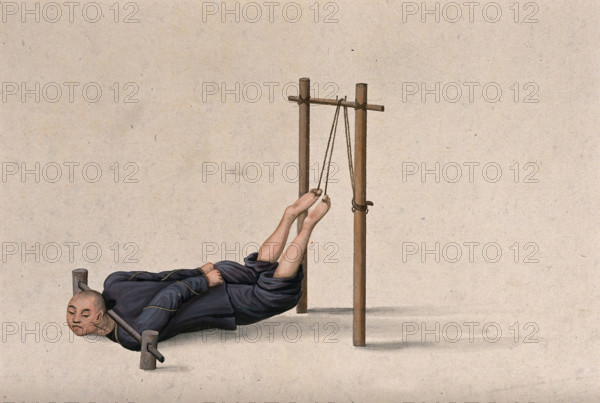 A Chinese man confined to a contraption which ties his legs on to a wooden gallows whilst... Creator: Unknown.