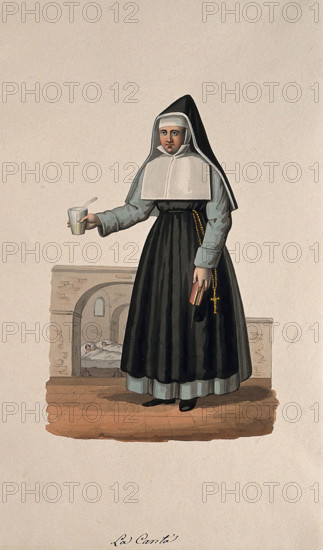 A nun in her habit carrying medicine and her Bible, with her hospital behind her. Creator: Unknown.