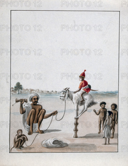 A man conducting a monkey show on the street, watched by some children, (between 1800 and 1899?). Creator: Unknown.