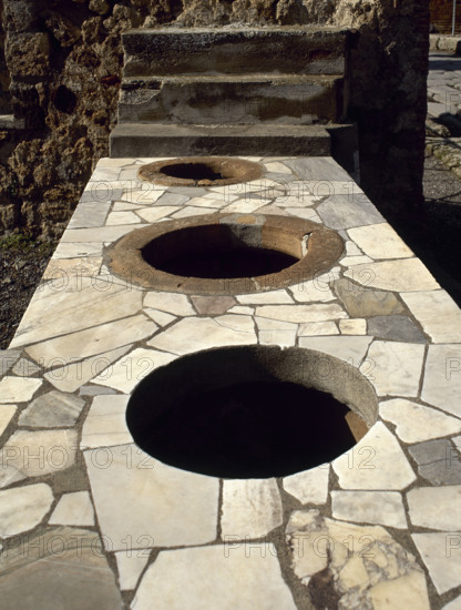 Marble-covered counter, Thermopolium, Via Consolare, Pompeii, Italy, 2002. Creator: LTL.