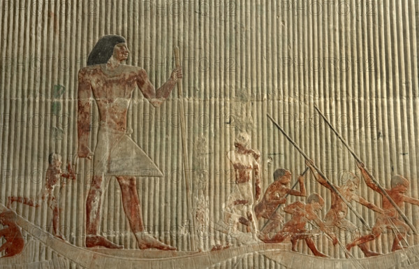 Relief detail of hunting scene before Ti standing on a ship, Mastaba of Ti, Egypt, 2003. Creator: Unknown.