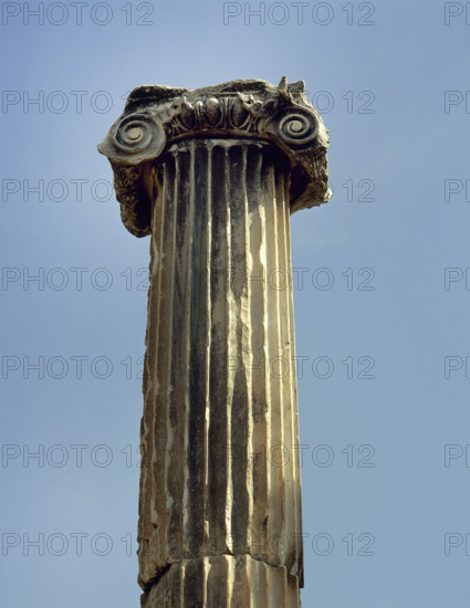 Ionic order, capital with voluta and column, Pergamon, Aeolis, Turkey, 1999. Creator: Unknown.