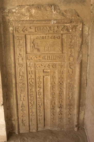 Hieroglyphic writing and deceased ofering food to the gods, Necropolis of Saqqara, Egypt, 2003. Creator: Unknown.
