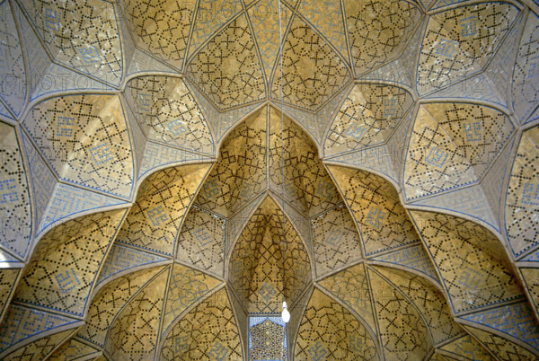Decorative muqarnas vaulting in the Iwan entrance, Jameh (Friday) Mosque, Isfahan, Iran, 2000. Creator: Unknown.