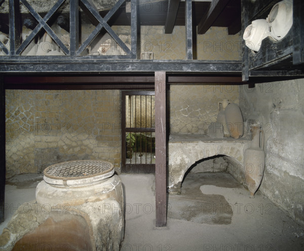 Wine shop, House of Neptune and Amphitrite, Herculaneum, Italy, 2002. Creator: LTL.