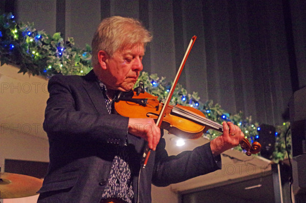 Mike Piggott, East Grinstead Jazz Club, Apron Café, Chequer Mead Theatre, West Sussex, April 2025. Creator: Brian O'Connor.