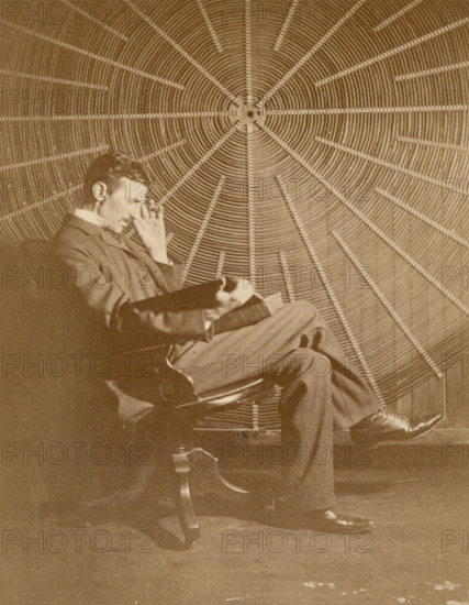 Nikola Tesla and his spiral oscillating transformer, 1896. Creator: Anonymous.