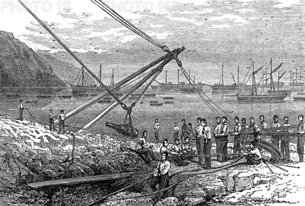 Landing guns at Munden's Cove, 1874. Creator: Unknown.