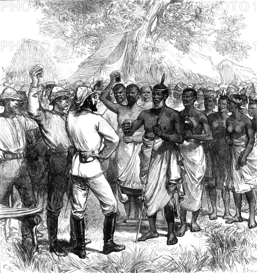 The Ashantee War: drinking the Queen's health in our camp, from a sketch by our special artist, 1874 Creators: Unknown, C. R..