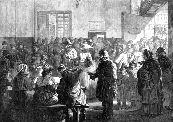 The Distress in Paris: giving soup to the poor at the charity kitchen, rue de Sevres, 1874. Creator: Jenkin.