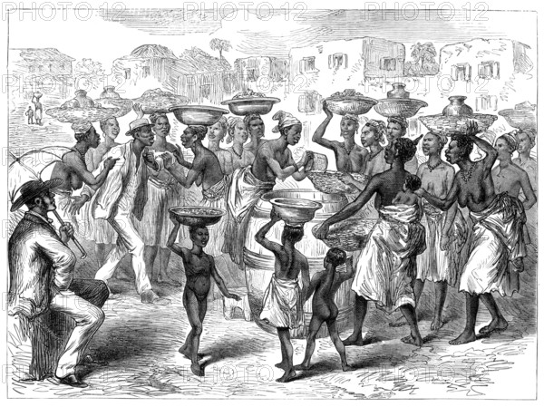 The Ashantee War: selling Indian corn in the streets of Cape Coast Castle, 1874. Creator: Unknown.
