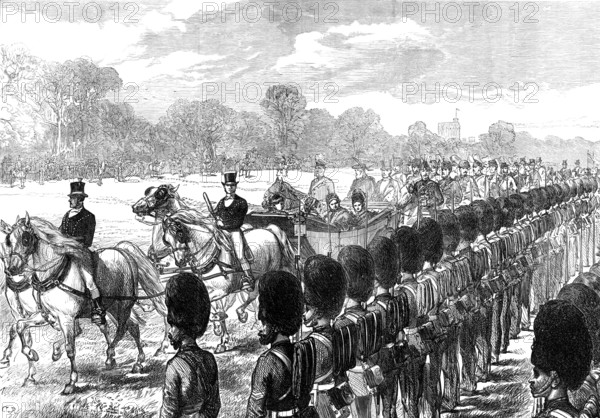 Review at Windsor of troops from the Ashantee War: the Queen passing along the line, 1874. Creator: Unknown.