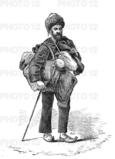 Jorgi, Mr. Suter's servant, carrying their bedding and provisions, 1881. Creator: Unknown.