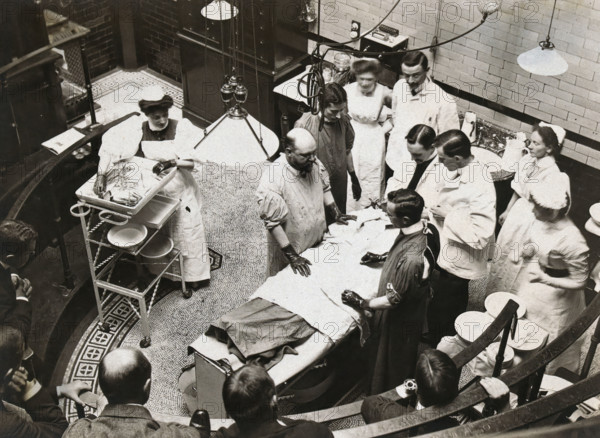 Charing Cross Hospital: Stanley Boyd in the old operating theatre, 1900. Creator: Unknown.