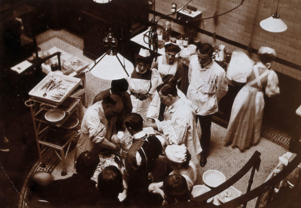 Charing Cross Hospital: Stanley Boyd in the old operating theatre, 1900 (1906). Creator: Unknown.