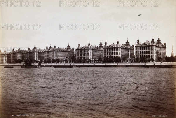 St Thomas's Hospital, Lambeth: exterior seen from across the Thames. Creator: Unknown.