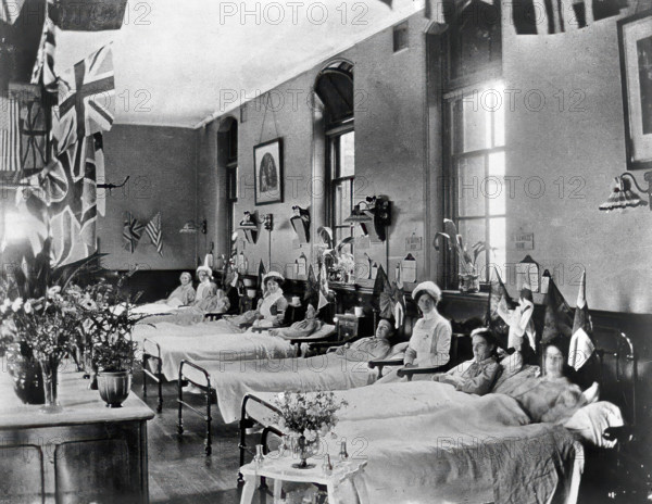 Hahnemann Hospital and Homeopathic Dispensaries, Liverpool: a women's ward, decorated..., [1910?]. Creator: Unknown.