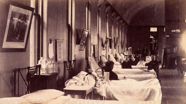 Bellevue Hospital, New York City: a ward for male patients with case-notes..., c1885/1898. Creator: Unknown.