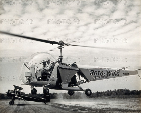 Sir Gordan Covell in a helicopter, Beltsville, Maryland, 1948. Creator: Unknown.