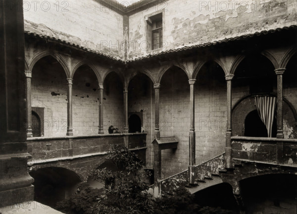 Hospital de la Santa María, Lérida: view of the staircase to the courtyard, c1900. Creator: Unknown.